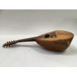 Sicilian mandolin the pick guard inlaid with tortoiseshell and mother of pearl, with mother of pearl