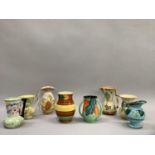 Eight early 20th century ceramic jugs by Myott, Fieldings, Crown Ducal, Caroline Ware, Roskyll and