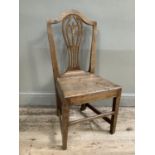 An oak country kitchen chair with pierced back on square legs
