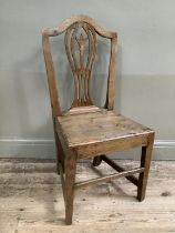 An oak country kitchen chair with pierced back on square legs