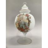 Opaque glass vase with stepped cover, the body of globular form painted with cartouche containing