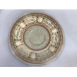 Mettlach cameo plate bearing German script in pink and cream, 41cm diameter