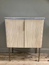 Crate and Barrel, bamboo effect drinks cabinet with brass effect handles with the two front doors to