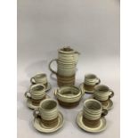 Broadstairs pottery studio coffee service in cream glaze comprising six coffee cups and saucers,