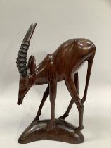 Wooden carved figure of a gazelle