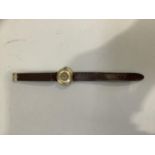 An early 20th. Century fob watch with an 18ct. gold open faced case No 95942 later converted with
