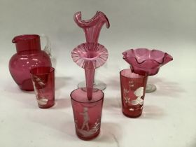 Two Mary Gregory style cranberry beakers hand painted with a silhouette of a woman and a child in