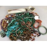 A quantity of jewellery all minerals including carnelian, amethyst, malachite, tiger eye and agate
