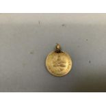 An early 20th century Indian gold coin with attached pendant loop Approximate weight 2gm