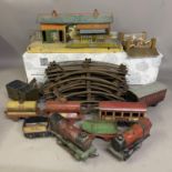 A collection of Hornby Series tin plate locomotives and rolling stock, including two steam trains (