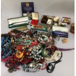 A collection of 20th century costume jewellery including necklace, bracelets, brooches, cufflinks,