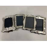 Four silver mounted moulded photograph frames