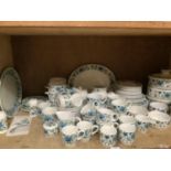 A large quantity of Mid-Winter blue and green floral table ware comprising three vegetable dishes