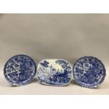 A pair of blue and white Imari chargers enamelled with ornamental pheasants within peonies and