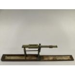 A late 18th century Guinea and half Guinea folding scale by A. Wilkinson, Ormskirk Lancashire, in