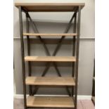 A set of contemporary metal and pine effect shelving with five shelves and crossed back, 101cm wide