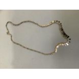 A festoon necklace in yellow, white and rose metal (this metal has been tested and valued as 14ct