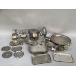 Quantity of silver plate on copper comprising two trays with gadroon rims on feet, two branch