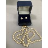 A cultured pearl necklace, the graduated pearls (approx maximum 7.5mm) fastened with a 9ct. gold