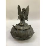 A modern bronze-effect dish and cover modelled as a fairy sitting upon a flower head 15cm high