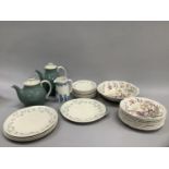 A Royal Doulton duck egg blue part service comprising coffee pot, hot water pot, eleven saucers