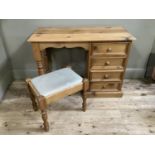 A single pedestal dressing table with four short drawers, cut out apron, turned legs and with stool
