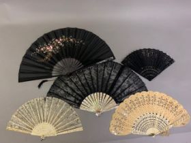 A 19th century bone Jenny Lind fan with elaborately carved gorge, designed with concentric bands
