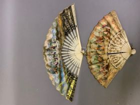 A small bone late 19th century/early 20th century gilded bone fan mounted with the known printed