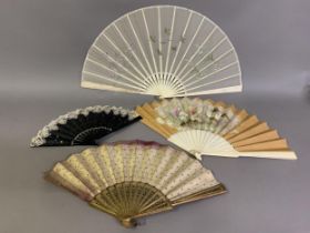 Four 19th/20th century fans: the first a large late 19th century example, biscuit coloured silk