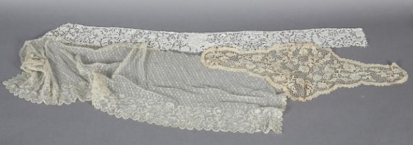 Antique Lace: An unused Youghal needle lace cap with side lappets, designed with meandering