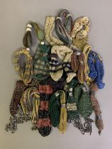 Miser’s Purses: a selection of 17 miser’s purses of different colours and designs, some beaded in