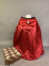 A 19th century red satin quilted petticoat, machine stitched, the upper section, a slightly