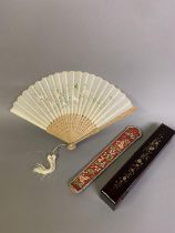 A Chinese silk embroidered fan sleeve, 19th century, gold couched thread embroidery on red silk,
