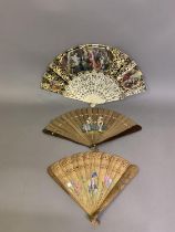 A mid-19th century bone fan with double paper leaf, the monture gilded and silvered and