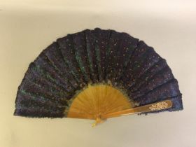 A scarce example of a Himalayan Monal pheasant feather fan, (Lophophorus impejanus), the monture