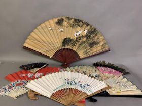 Oriental fans: A selection of folding fans to include 3 Chinese feather fans mounted on pierced