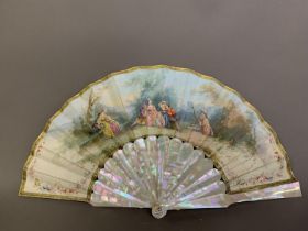 C 1860’s, a good mother or pearl fan, burgau, the vellum leaf painted with young lovers listening to