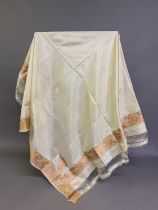 A fine ivory silk Indian shawl