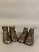 Victorian boots for young children: a pair of brown leather ankle boots labelled Startrite, (company