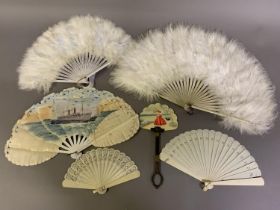 A selection of fans for a young girl, 20th century, to include a fixed fan with the head of a cat at