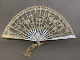 Brussels Bobbin Appliqué: a large and showy Belgian lace fan, the monture of mother of pearl, a good