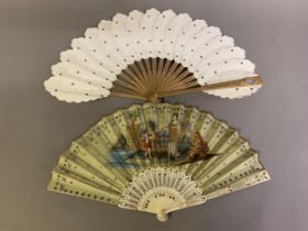 An unusual embroidered fan, the bone monture pierced and set with steel roundels, the silk leaf