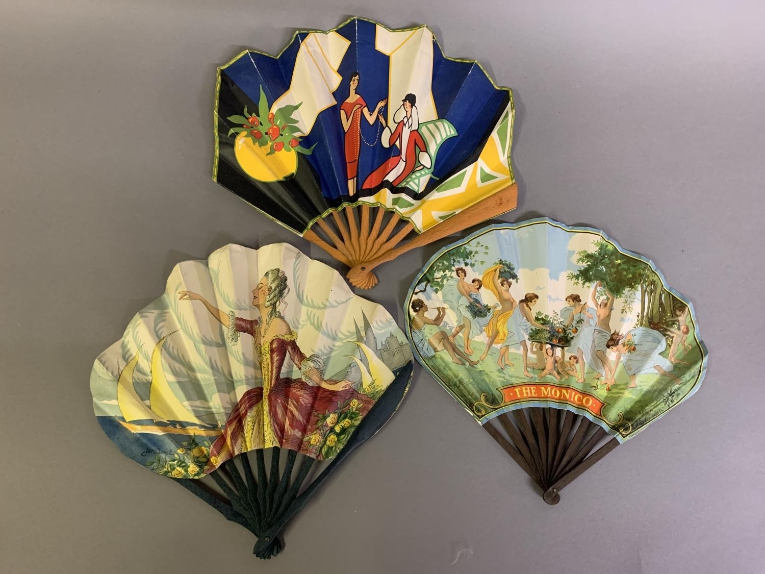 A very Deco ballon fan, unusually with straight sides, showing an elegant lady choosing her