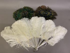 A late 19th century white ostrich feather fan, the monture of white mother of pearl, plain other