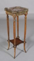 AN EARLY 20TH CENTURY FRENCH POLISHED BEECH AND GILT METAL MOUNTED ETEGERE having a marble top,