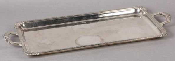 A GEORGE VI SILVER TWO HANDLED TRAY, Sheffield 1940 maker's mark for Walker & Hall, rectangular,