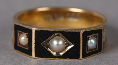 A VICTORIAN DRESSED HAIR MOURNING RING, seed pearl, enamel and dressed hair, the three seed pearls