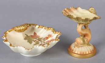 A ROYAL WORCESTER SHELL AND DOLPHIN BONBON DISH in blush ivory and gilt, 11cm high together with a