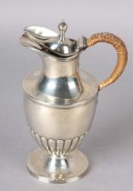 A LATE GEORGE III SILVER HOT WATER JUG, London 1810, maker's mark for William Bennett the half