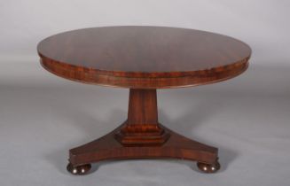 A MID 19TH CENTURY MAHOGANY BREAKFAST TABLE, having a circular tilt top on a tripartite pedestal and